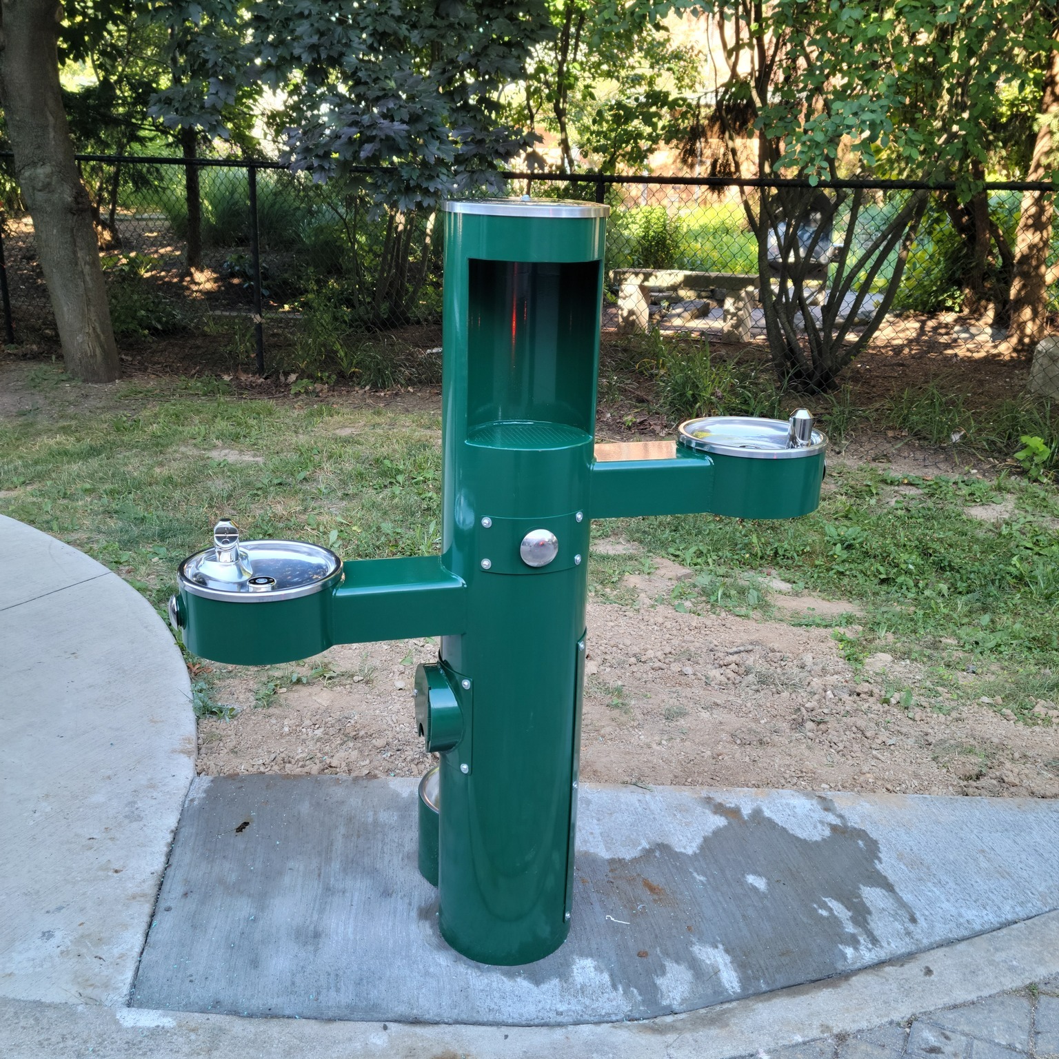 Green outdoor water fountain