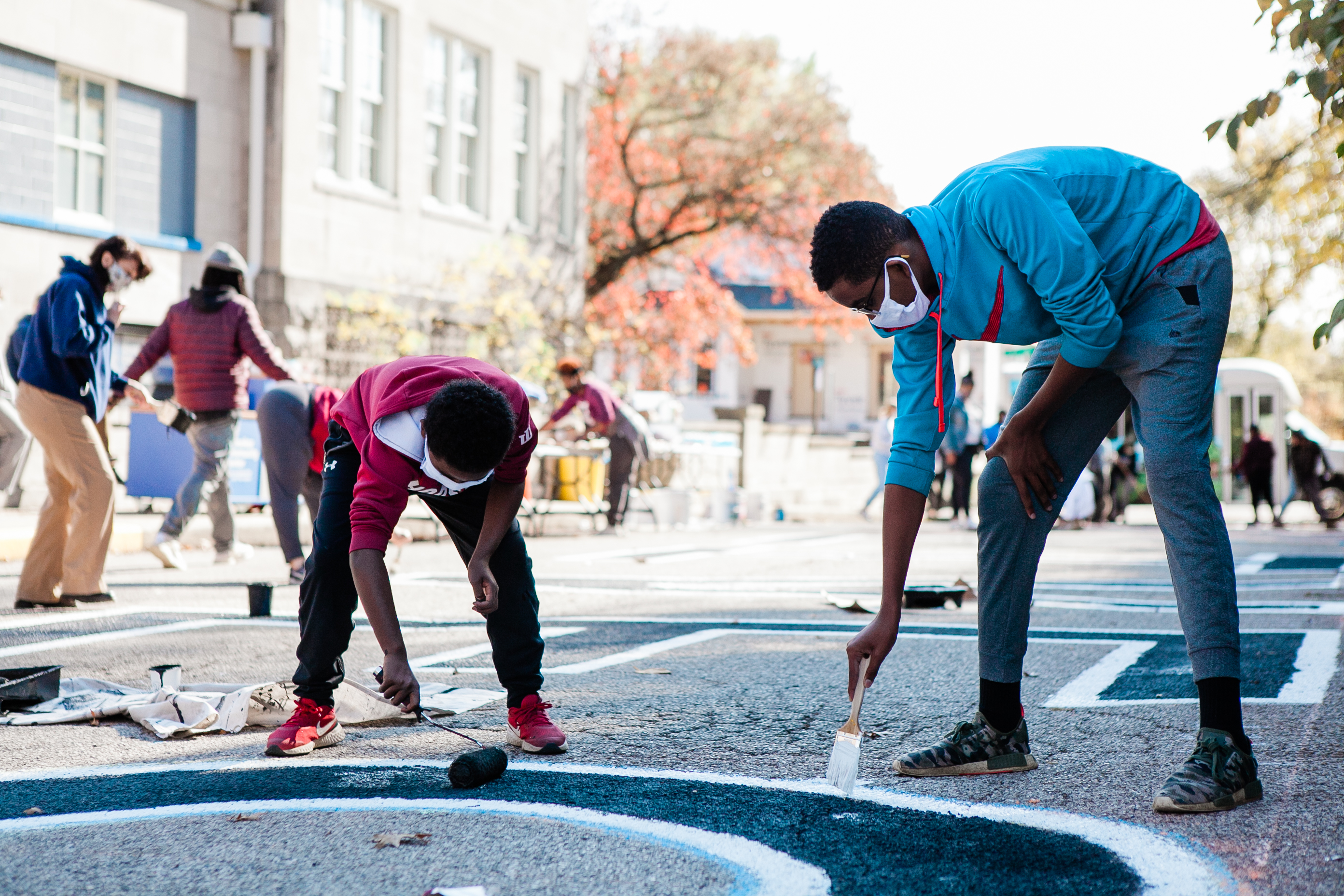 Residents painting mural