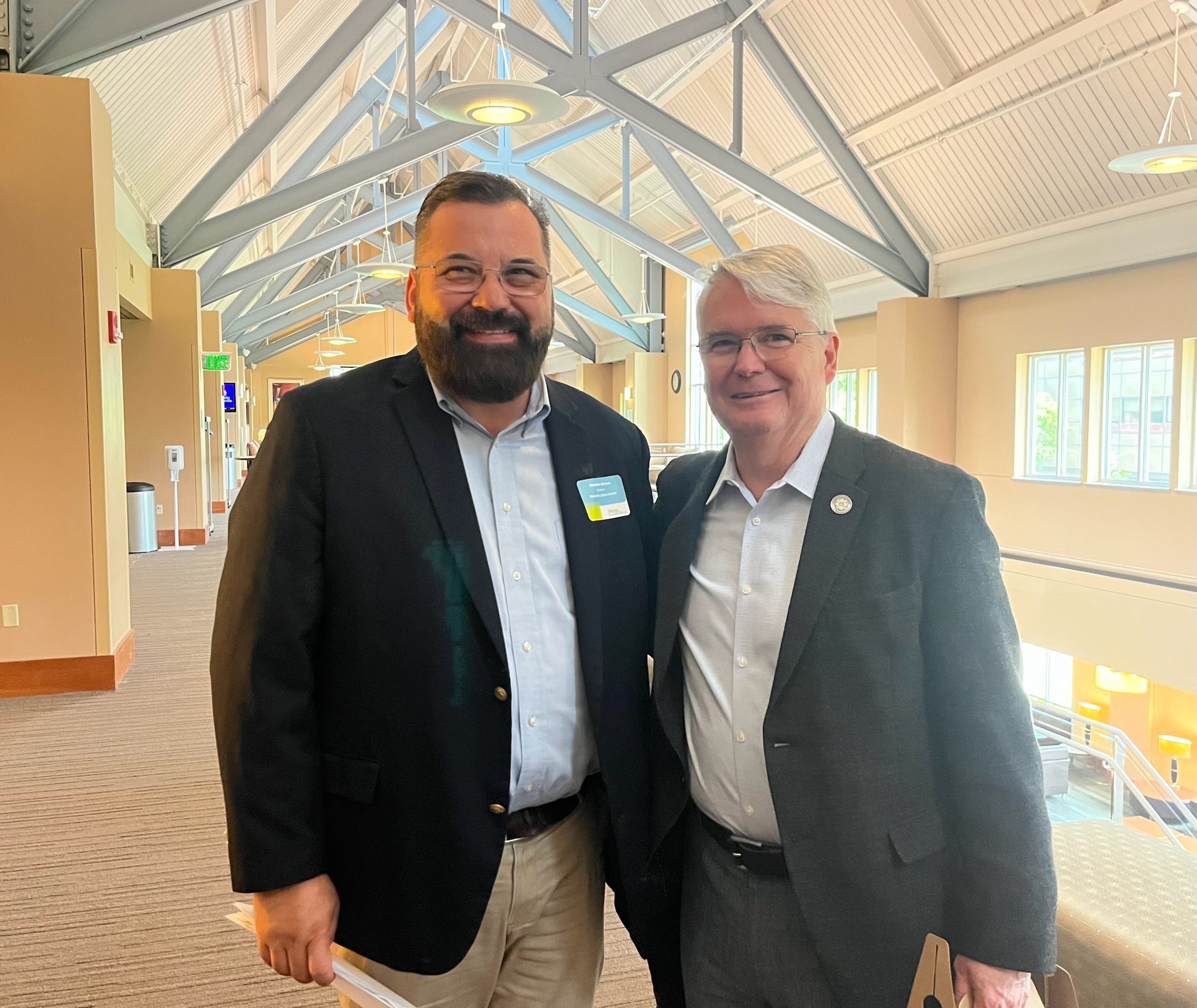 Mayor John Hamilton talks with Abraham Brown, co-owner of La Campirana restaurant and Director of Latino Ministry at Holy Name of Jesus Catholic Church in Evansville. Mr. Brown and other community members in Evansville are establishing Evansville as the next “CDFI “Friendly” city, a model that Bloomington established in 2019. 