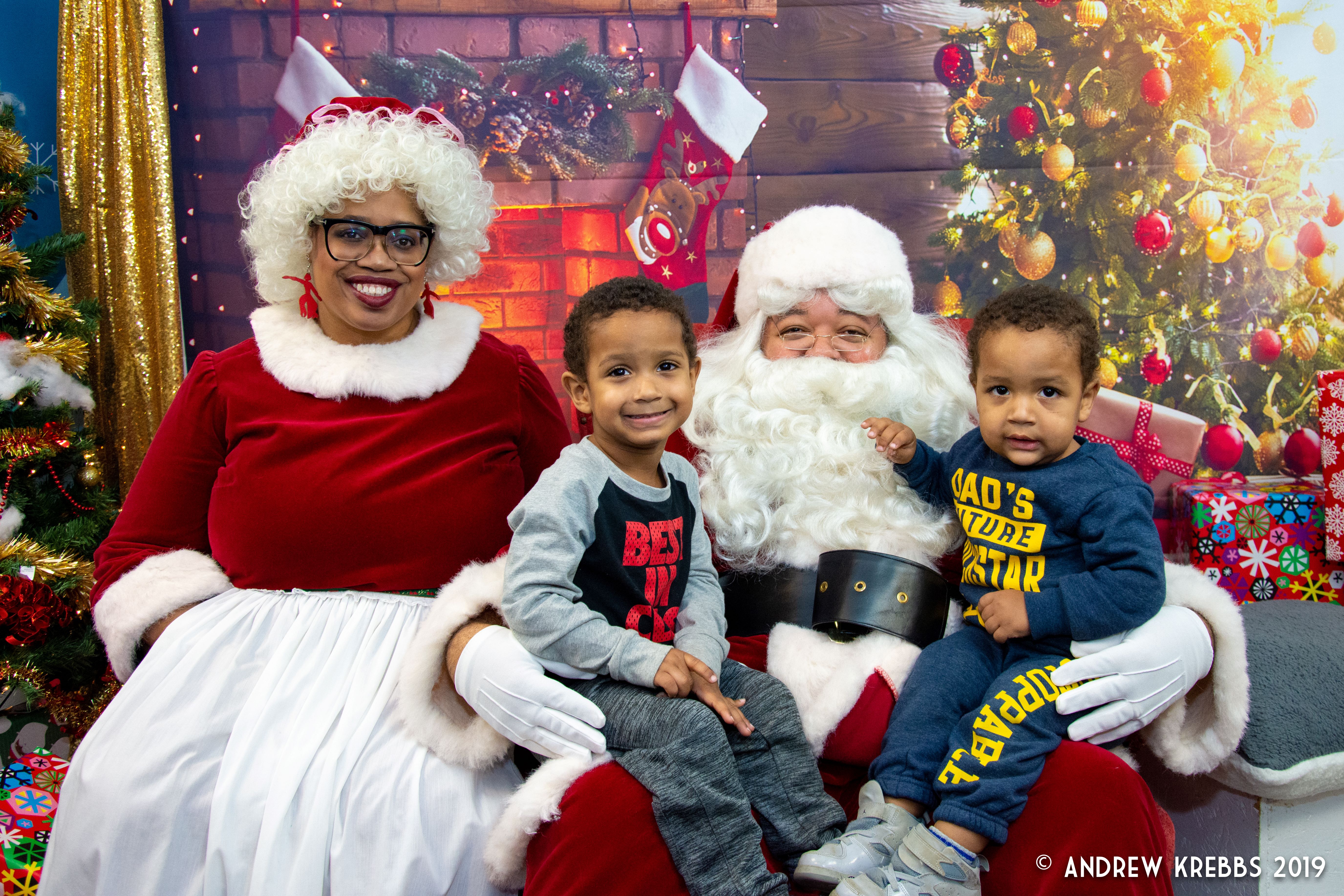 Children pose with Santa and Mrs Claus