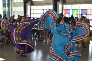 A picture of dancers performing at the Fiesta del Otono event in 2022.