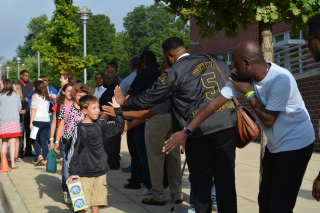 Million Father March welcomes students to Fairview Elementary on the first day of school in 2022