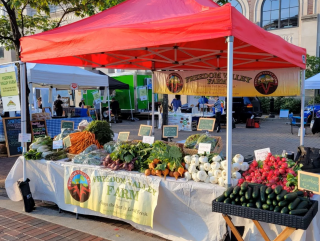 Freedom Valley Farm's stand at the market, courtesy of the Freedom Valley Farm website