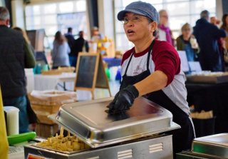 Bivianna serving tamales
