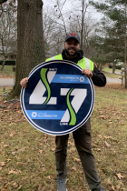 Michael Large holding 7-Line Decal