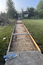 Sidewalk construction near Bloomington Community Orchard