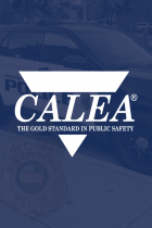 CALEA logo on dark blue background of police vehicle