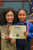 Katie Rodriguez with student winner in council chambers.