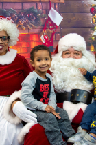 Children pose with Santa and Mrs Claus